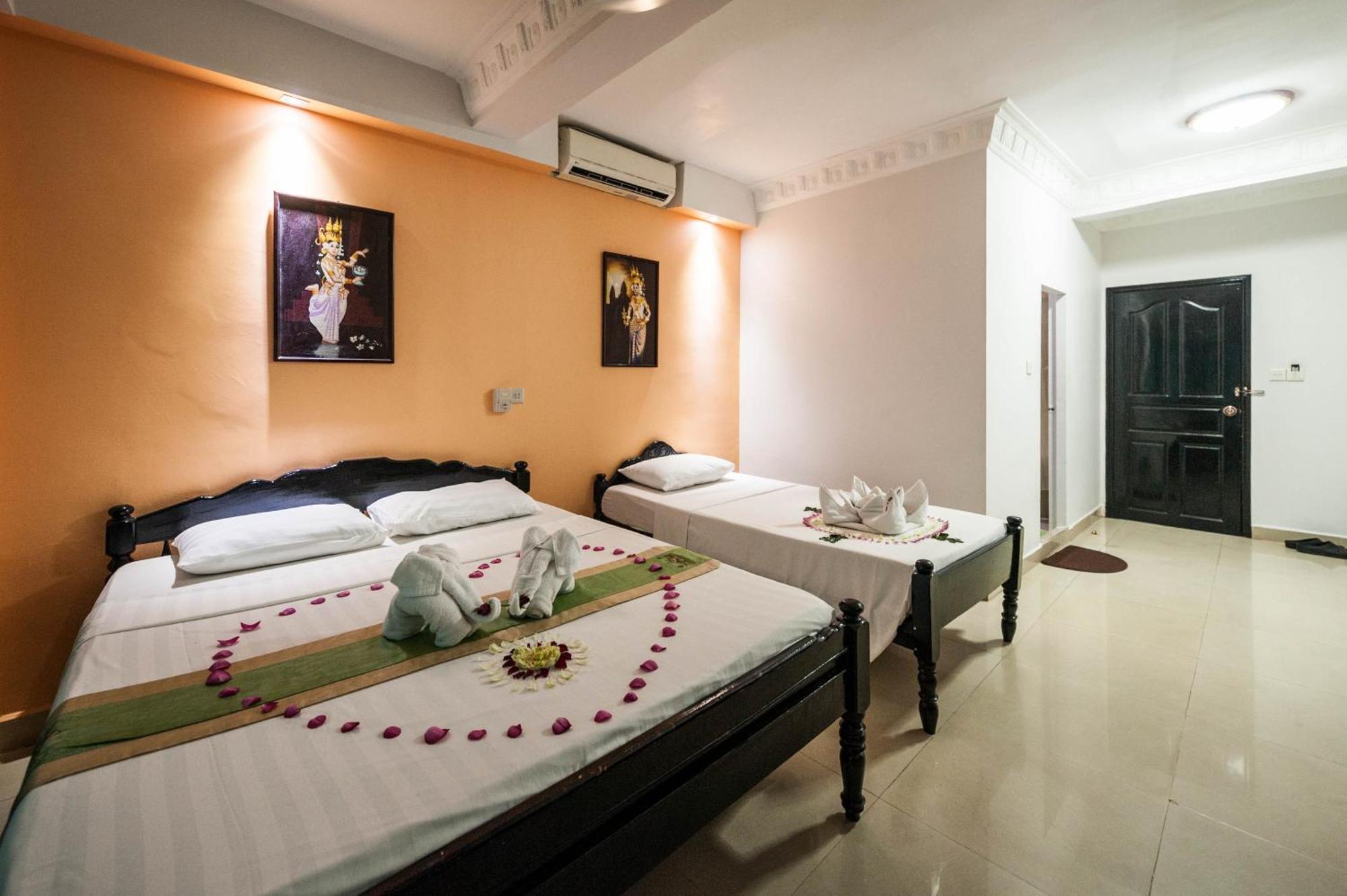Angkor International Hotel Phnom Penh Quarto foto